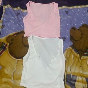 2 V cut crop tops from SHEIN, WHITE and LIGHT PINK , size small .